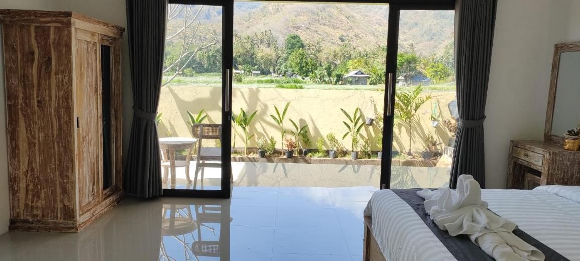 Amed Yudhadewata Hotel Bagian luar foto